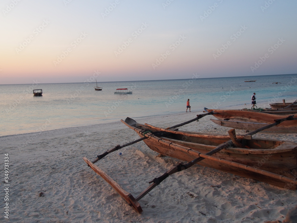 A small boat and a beautiful sunset sky, Nungwi, Zanzibar, Tanzania