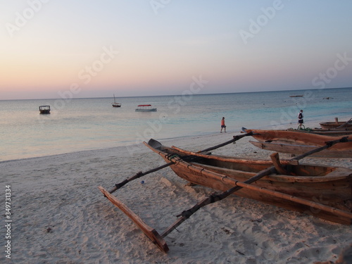 A small boat and a beautiful sunset sky, Nungwi, Zanzibar, Tanzania