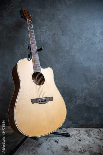 acoustic guitar on grunge background