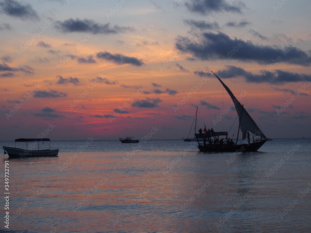 The beautiful sunset sky from the beach, Nungwi, Zanzibar, Tanzania The beautiful sunset sky from the beach, Nungwi, Zanzibar, Tanzania