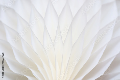 White abstract background with bizarre pattern. Soft lines transition light and dark shadows. Photos with soft focus.