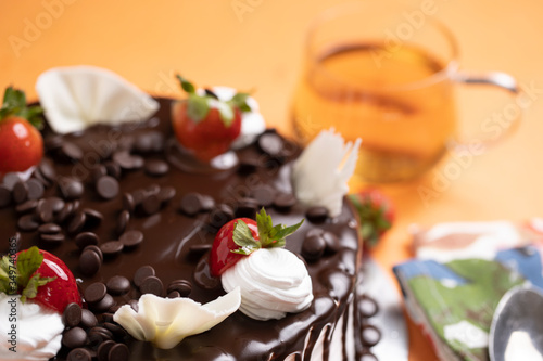 Chocolate chip topping with hot chocolate dripping cake stock photo photo