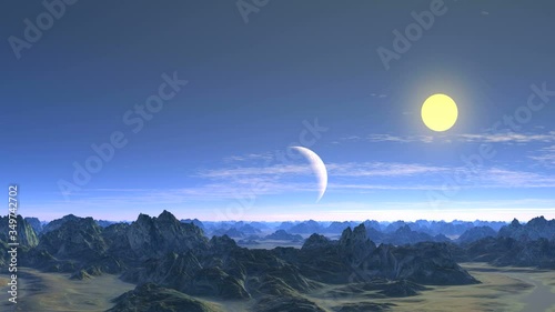 Alien Blue Moon in the Clouds. Above the mountains and valleys in the blue sky, the planet is in partial shade.The sun shines brightly, quickly floating clouds.
