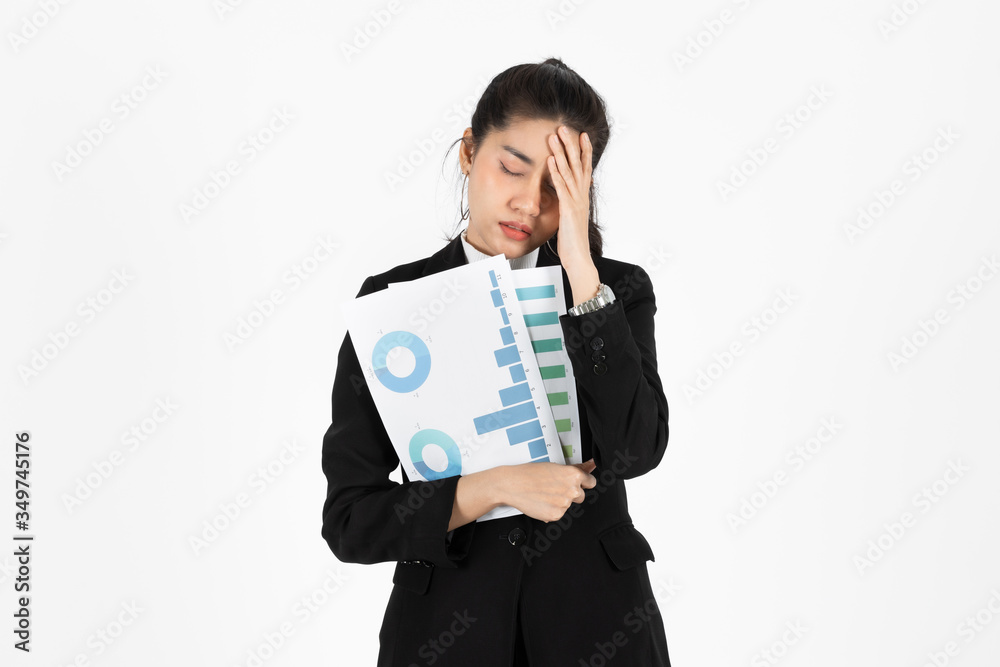 Frustrated overworked and confused young Asian business woman in suit troubled with financial problem over white isolated background. Frustrated overworked and confused young Asian business woman in suit troubled with financial problem over white isolated background.