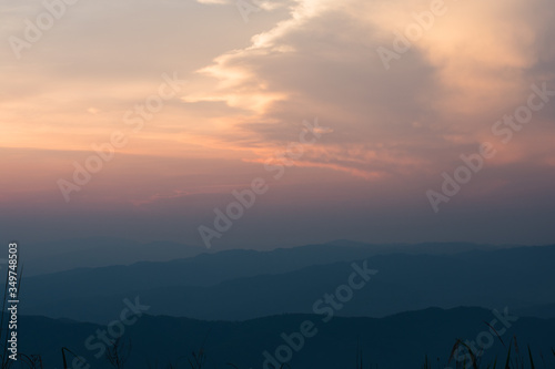 The sky and the mountains alternate after the sun sets.