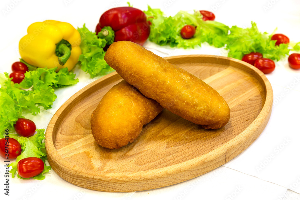 Pie, tart, pastry, baked gate with filling on a plate on the table, lunch, fast food
Pie, tart, pastry, baked gate with filling on a plate on the table, lunch, fast food