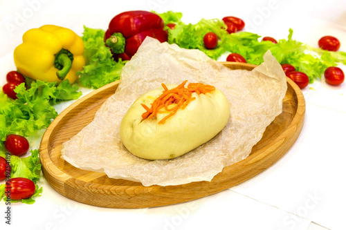 Pie, tart, pastry, baked gate with filling on a plate on the table, lunch, fast food 