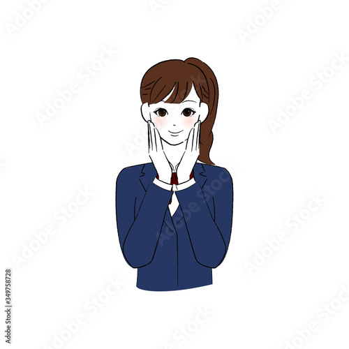 頬に両手を添える女子学生