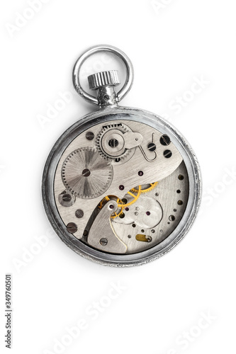 Pocket watch with open mechanism on white. Clockwork.