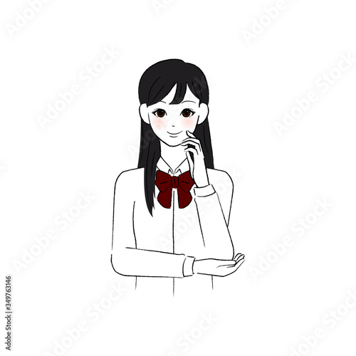 左手を頬にそえて微笑む女子学生