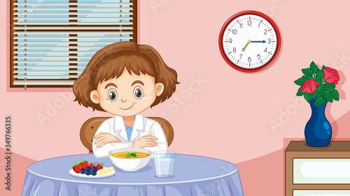 Girl having breakfast in the morning photo