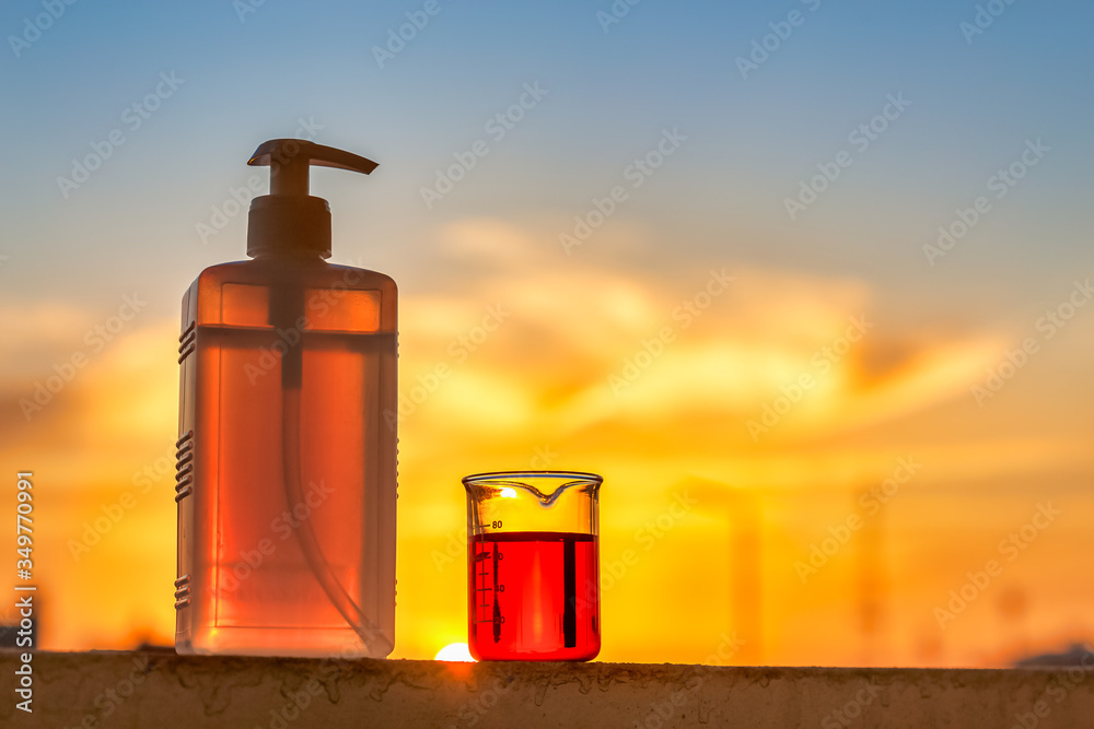 Corona virus prevention hand sanitizer gel in bottle isolated in outdoor background. Corona virus prevention hand sanitizer gel in bottle isolated in outdoor background.