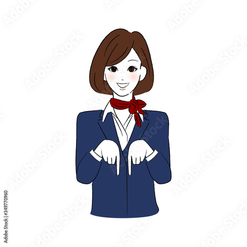 笑顔で指をさす制服を着た女性