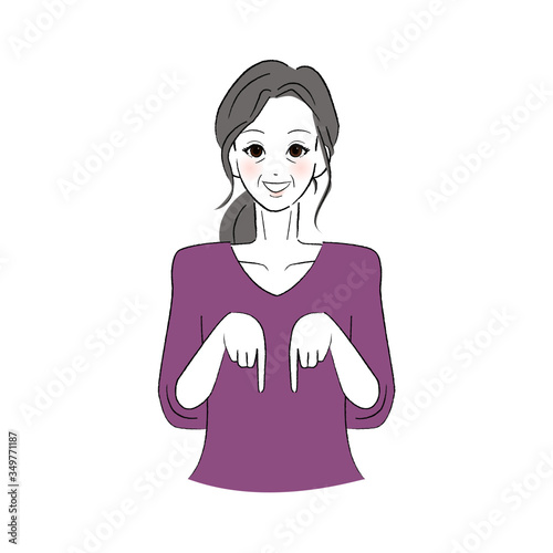 笑顔で指をさすシニア女性