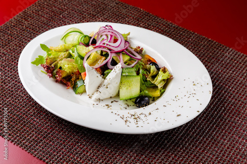 Vegetable and meat salad, classic salad for lunch in a restaurant