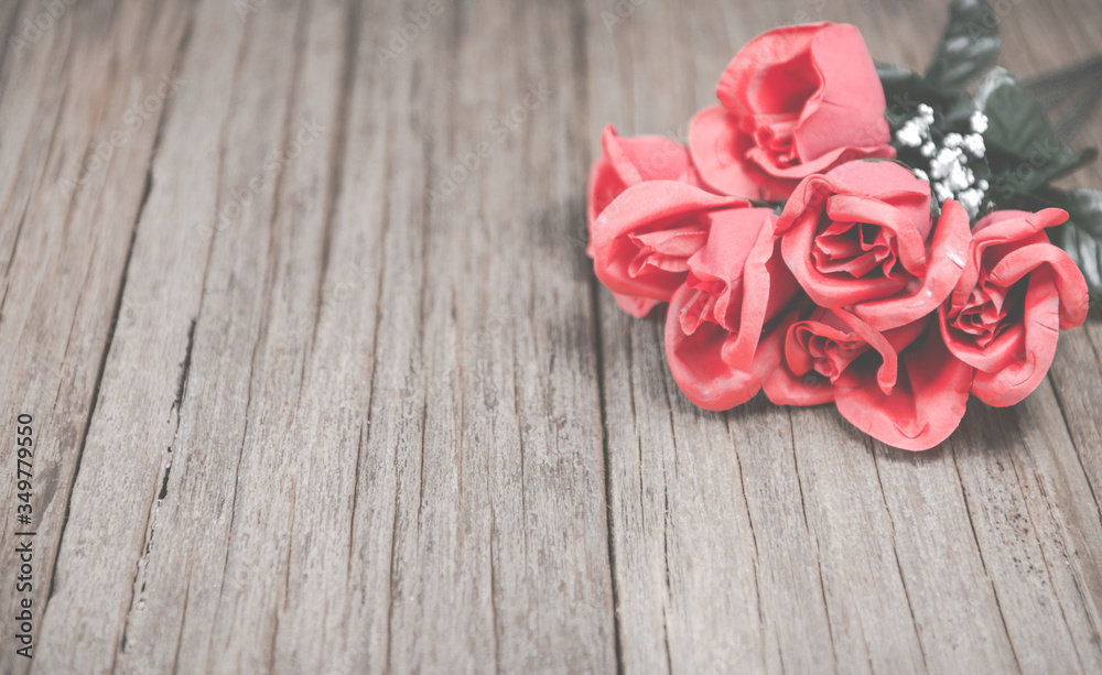 a bunch of rose on the wooden table top ,Ready for display montage,for valentine's day...