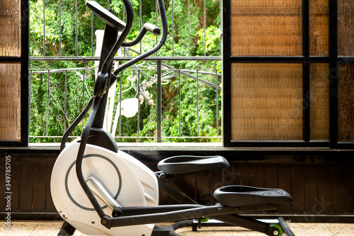 Hybrid magnetic elliptical trainer. Cardio Trainer Side View. Weight Training Weights. Modern Cross Trainer. Stationary simulator. Health Fitness Gym Machine