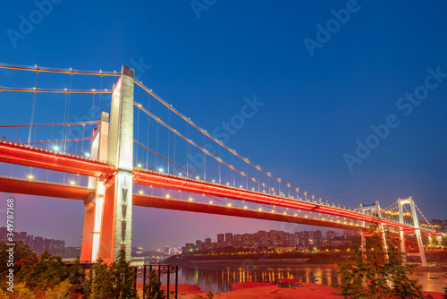 At night, two suspension bridges on the Yangtze River, Chongqing, China