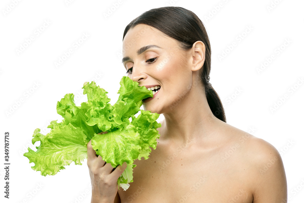 portrait of a girl with clean skin without makeup with a leaf of green salad portrait of a girl with clean skin without makeup with a leaf of green salad