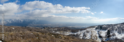 фотографія large panoramic view of snow covered mountains and valley in Utah