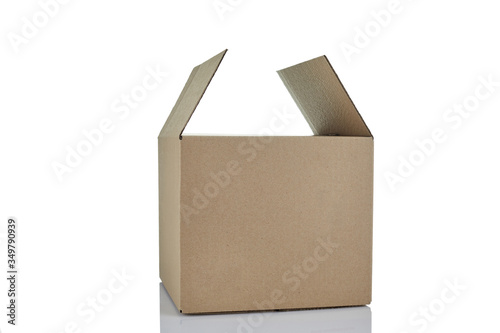 Opened cardboard box isolated on white background