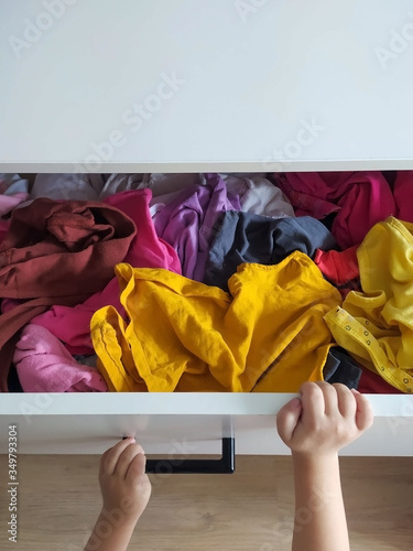 Chaos in the dresser and children's hands