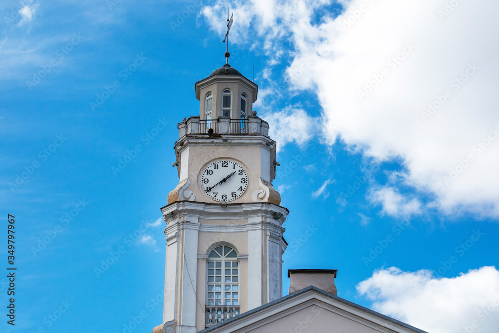 Vitebsk, Belarus. Close Up Of Old Town Hall. City Hall, Clock Tower Is Famous Landmark In Sunny Day Vitebsk, Belarus. Close Up Of Old Town Hall. City Hall, Clock Tower Is Famous Landmark In Sunny Day