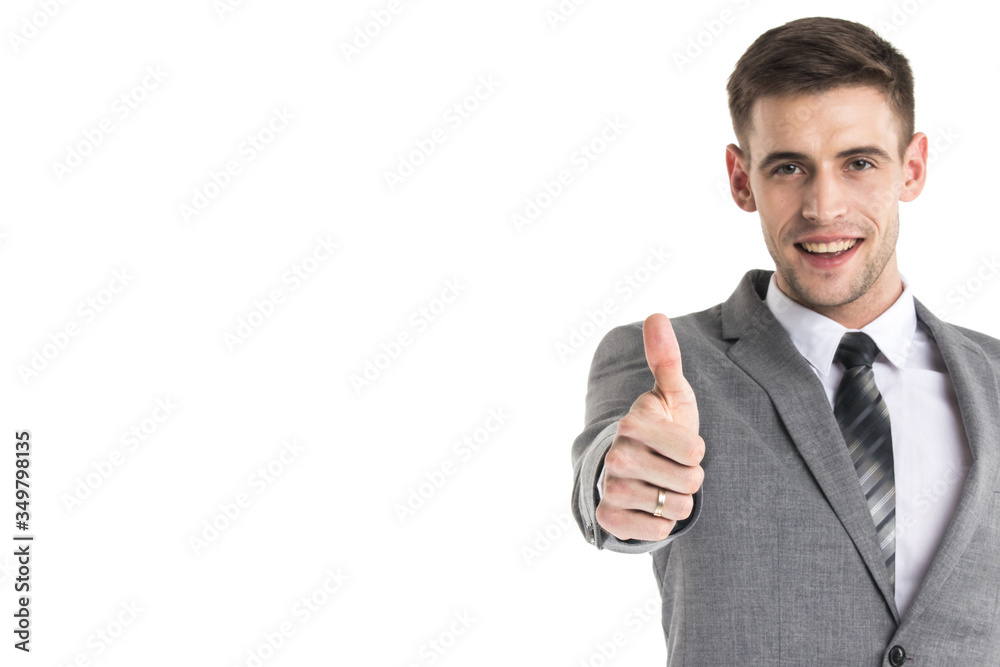 Smiling businessman with thumb up