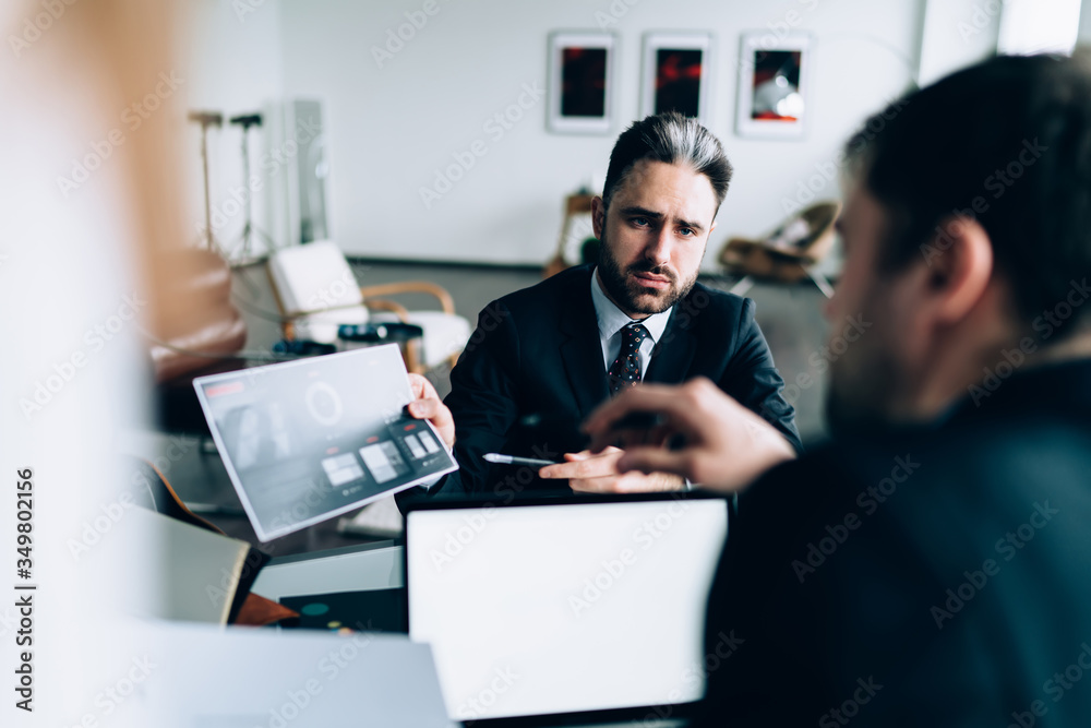 Business coworkers discussing problems at office Business coworkers discussing problems at office