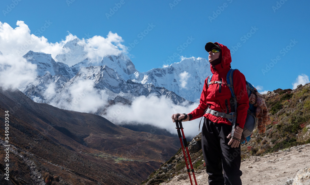 Active hiker in travel to Everest  enjoying the valley view in Himalaya mountains  landscape