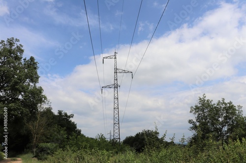 Pylône électrique métallique haute tension  - Village de Grenay - Département Isère - France photo