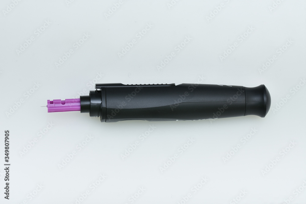 Fototapeta premium white Lancet pen on white background. Diabetes concept