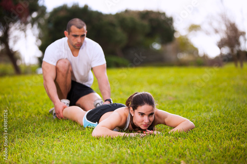Couple exercising at the park