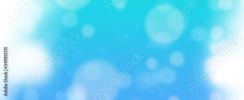 Glowing blue circles. Spring concept. Blurred bokeh circles. Website banner. Celebration. Christmas.