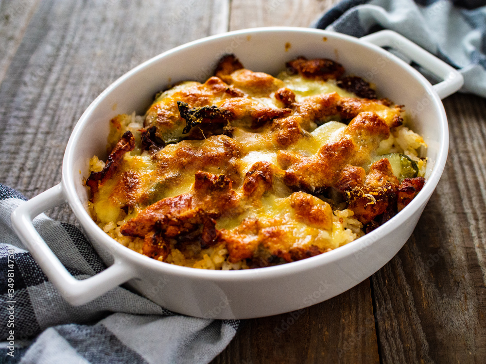 Rice casserole with barbecue chicken breast, cheese and vegetables
Rice casserole with barbecue chicken breast, cheese and vegetables