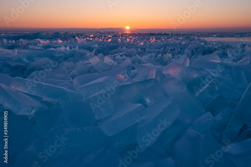 Baikal frozen lake in winter season in a morning sunrise view from Uzury bay, Siberia, Russia