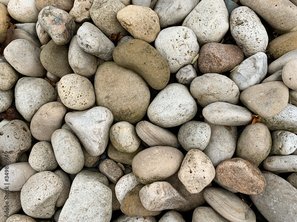 Close-up photo of smooth rocks. Stone background. Close-up photo of smooth rocks. Stone background.