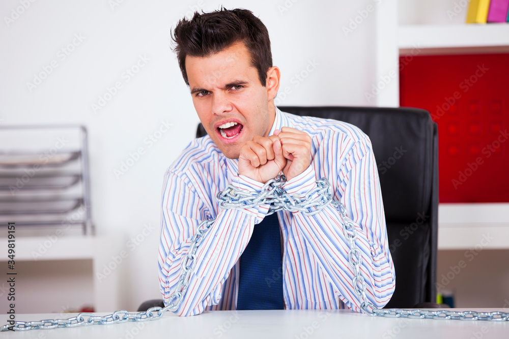 Naklejka premium Businessman captive at his office