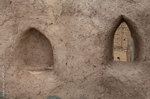 Window and niche in old clay house in Al Hamra, Oman