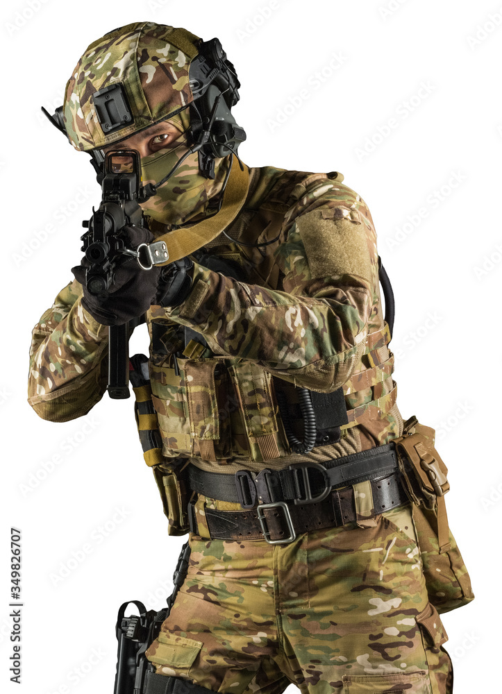 Soldier holding assault rifle. Uniform conforms to special services of the Russian Federation. Shot in studio. Isolated with clipping path on white background Soldier holding assault rifle. Uniform conforms to special services of the Russian Federation. Shot in studio. Isolated with clipping path on white background