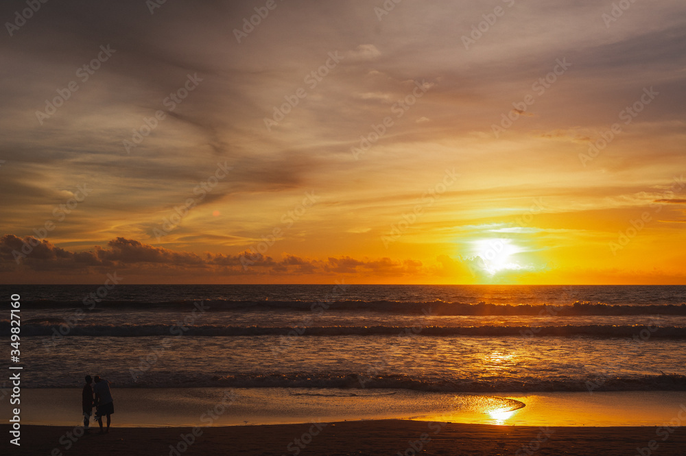 Magical dramatic sunset on a tropical beach.