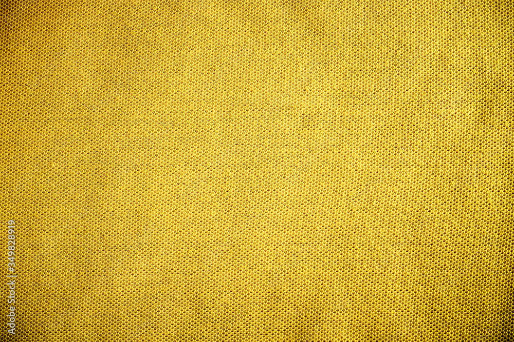 Obraz premium Yellow fabric texture, vintage background, macro shot.