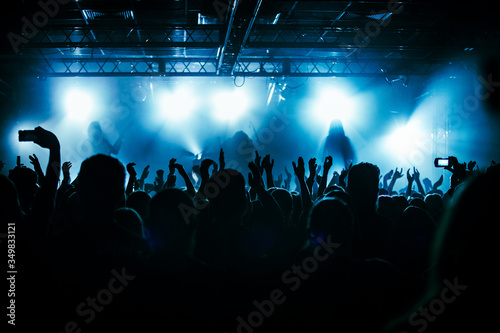 applause during the big show. hands of fans at a concert
