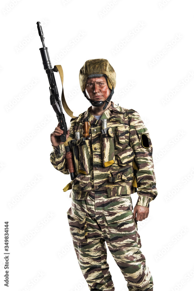 Male in uniform conforms to Russian army special forces (OMON) in War in Chechnya. Isolated on white background Male in uniform conforms to Russian army special forces (OMON) in War in Chechnya. Isolated on white background