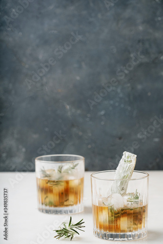 Misted glass of whiskey on the rocks