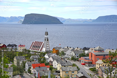 Town of Hammerfest with the cathedral, mountains & fjords in the background. Hammerfest is the northernmost town in the world with more than 10,000 inhabitants, county, Norway. photo
