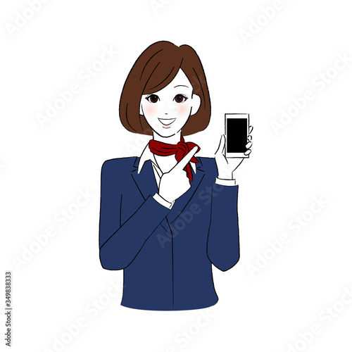 スマホを指差す制服を着た女性
