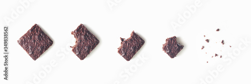 Konstfotografi Chocolate brownies, five devoured steps, isolated on white background