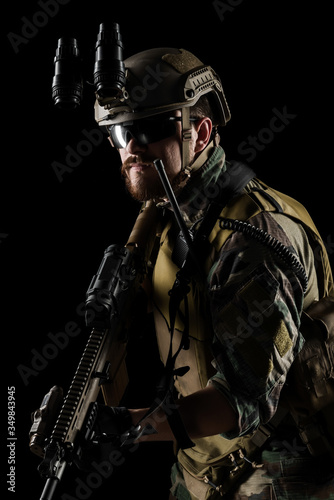 US marine corps soldier with weapon. Shot in studio. isolated with clipping on black background. © maximapryatin