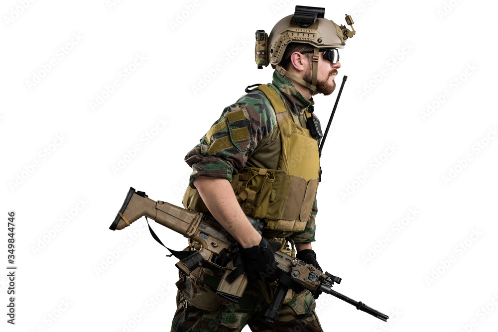 US marine corps soldier with weapon. Shot in studio. isolated with clipping on white background. US marine corps soldier with weapon. Shot in studio. isolated with clipping on white background.